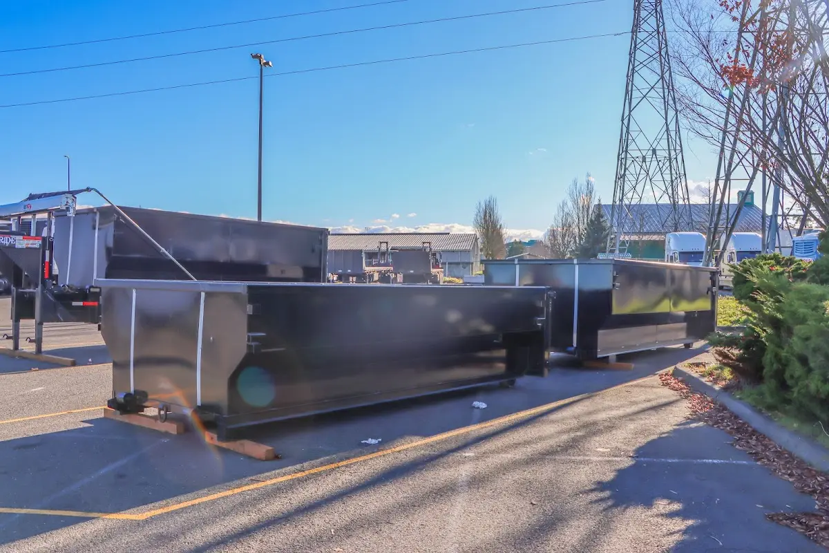 Roll-off dumpster ready for waste disposal at job site for 30 Yard Dumpster Rental in Saugus